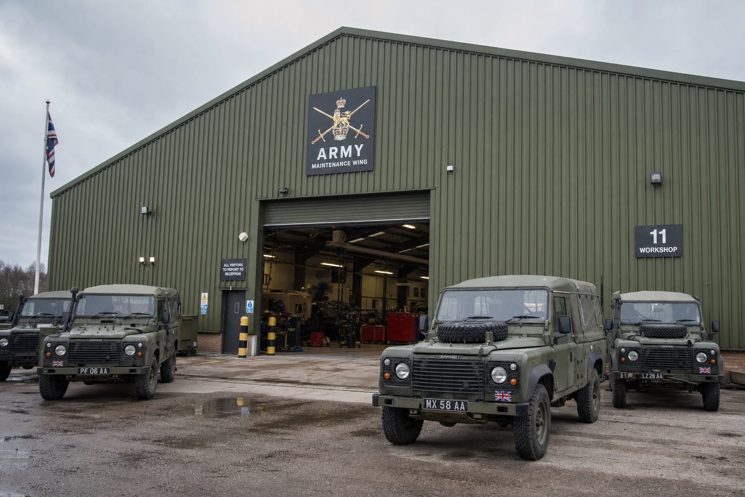 A vehicle maintenance workshop with utility vehicles parked outside